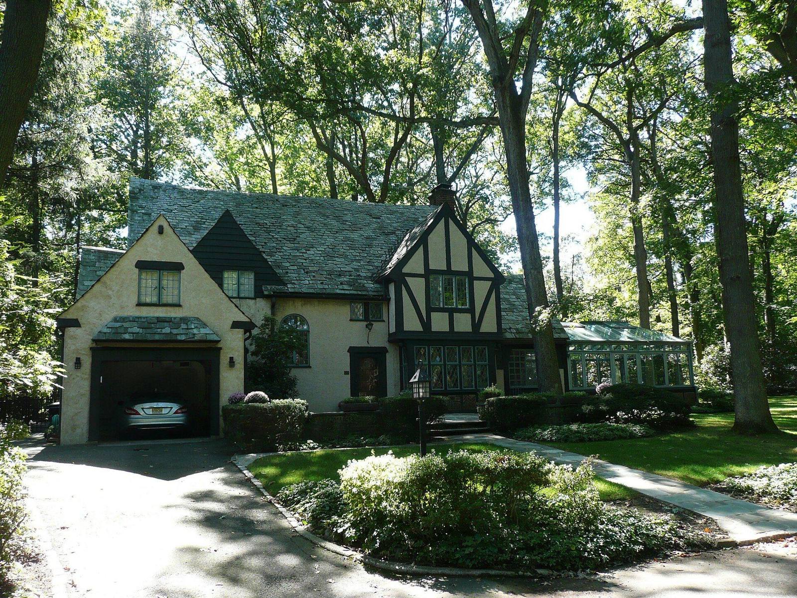 The Von Schmid House at 580 Park Street, Montclair, a Tudor Revival house with half-timbered gables, a steep roofline and leaded windows.